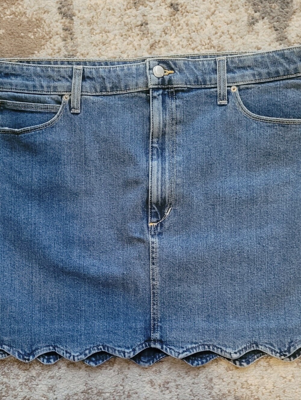 Joe's Jeans light blue denim skirt with tan label